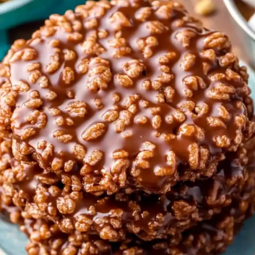 Star Crunch Dessert You Need To Try Now (No Oven Required!) 4 Homemade Star Crunch cookies with caramel and chocolate on rustic wooden counter