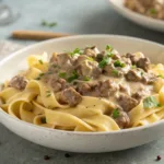 creamy ground beef stroganoff with mushrooms and egg noodles