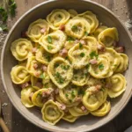 Tortellini carbonara with parsley and Parmesan