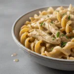 Slow cooker chicken and noodles in creamy sauce close-up